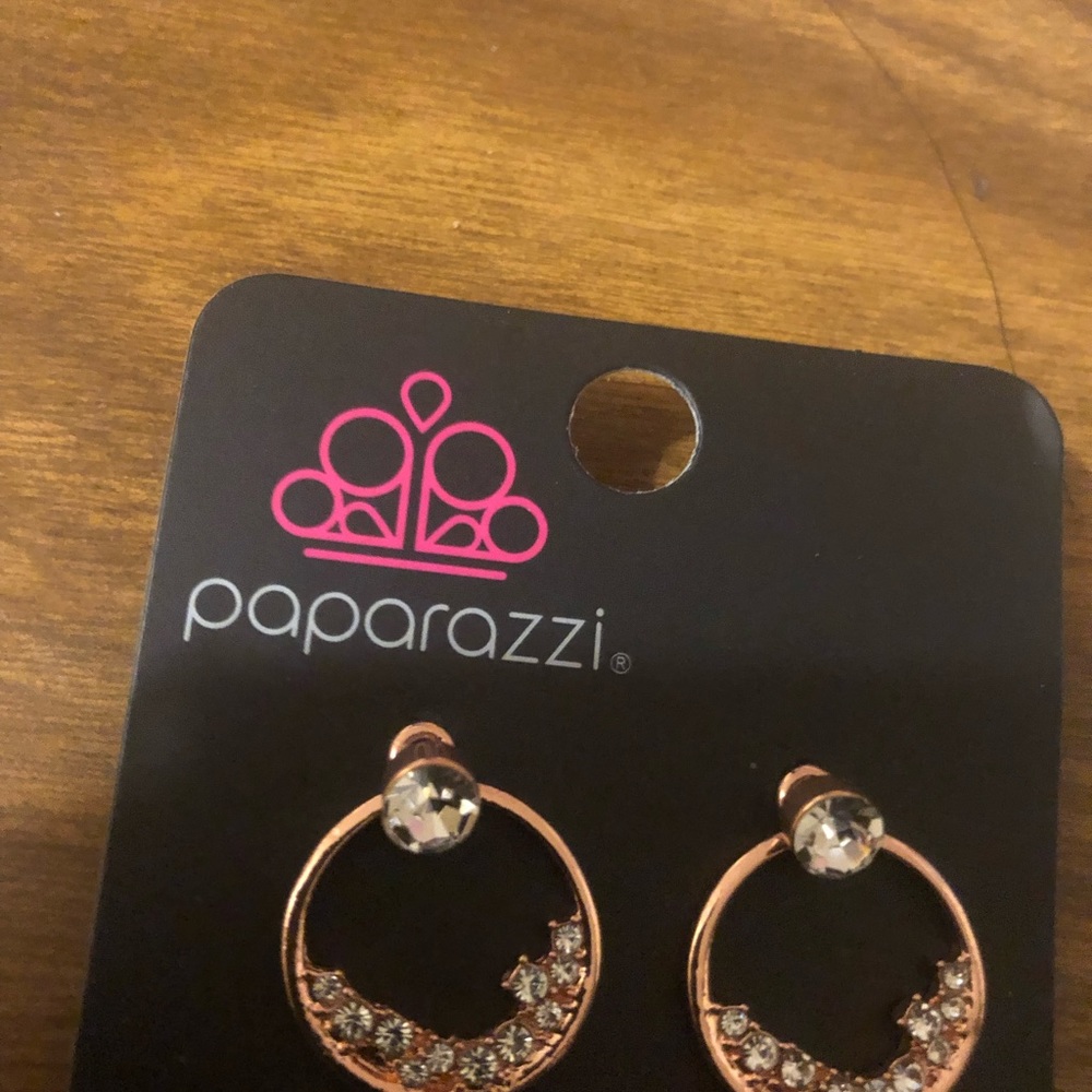 Brand New. Never been worn. Paparazzi multi color and design post earrings.